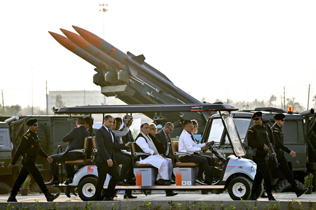 India's Defense Minister Rajnath Singh (C-L) with his French counterpart Catherine Vautrin (C-R) takes a tour of the production facility for Airbus H125 helicopters, after its inauguration at Vemagal in Kolar district, on Feb. 17, 2026. (Idrees Mohammed/AFP via Getty Images)