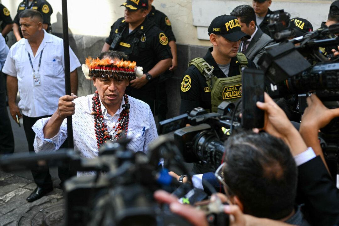 Peruvian congressman Segundo Montalvo speaks with the media on arrival at the Faustino Sanchez Carrion building of the legislative branch where Peru's Congress is set to consider whether to impeach interim president Jose Jeri in Lima, Peru, on Feb. 17, 2026. Jeri is accused of the irregular hiring of several women in his government, and dozens of lawmakers back a motion to oust him on claims of influence peddling. (Ernesto Benavides/AFP via Getty Images)