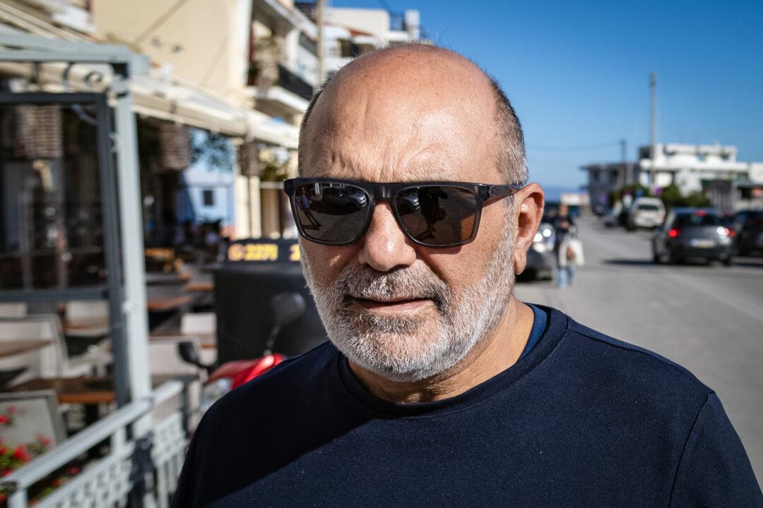 Kostas Moundros, president of the Chios Tourism Organization, stands near his office in Chios, Greece, on Nov. 13, 2025. (John Fredricks/The Epoch Times)