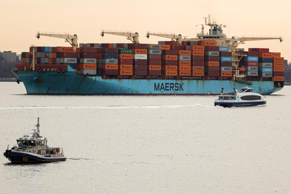 A Maersk cargo ship loaded with shipping containers navigates through New York Bay, on Jan. 23, 2026. (Charly Triballeau/AFP via Getty Images)