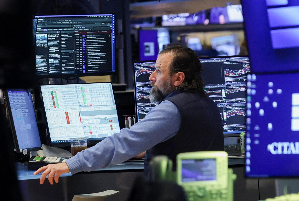A trader works on the floor of the New York Stock Exchange at the opening bell in New York, on Feb. 20, 2026. (Timothy A. Alary /AFP via Getty Images)