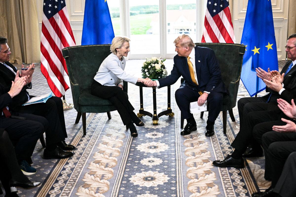 President Donald Trump shakes hands with European Commission President Ursula von der Leyen after agreeing on a trade deal between the two economies following their meeting, in Turnberry, Scotland on July 27, 2025. (Brendan Smialowski /AFP via Getty Images)