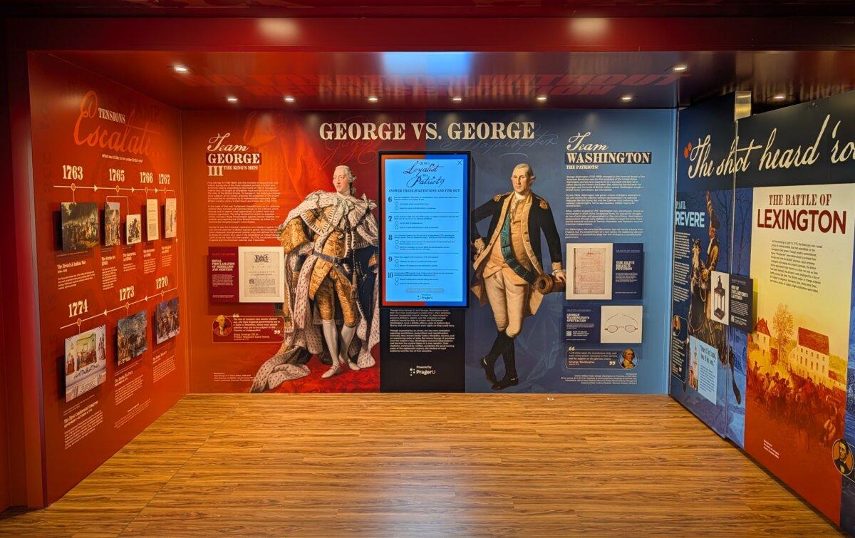 The wall titled “George vs. George” contrasts the first U.S. president with King George III of Britain. (Jacob Burg/The Epoch Times)