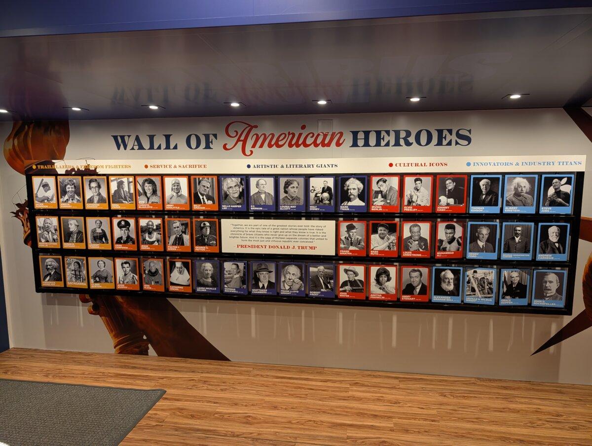The "Wall of American Heroes" presents photos of Albert Einstein, Johnny Cash, Walt Disney, Frank Lloyd Wright, Robert Frost, and more. (Jacob Burg/The Epoch Times)