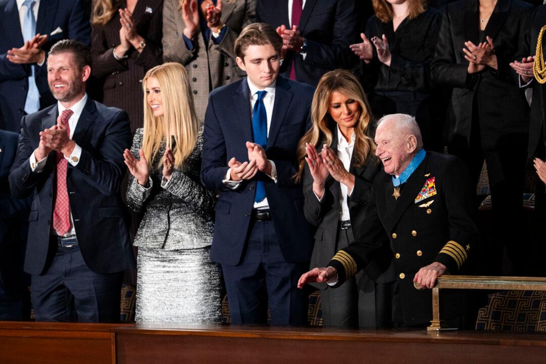 US veteran Captain E. Royce Williams is presented with the Medal of Honor by First Lady Melania Trump at President Donald Trump's first State of the Union address during his second presidential term, in the House Chamber on Capitol Hill in Washington on Feb. 24, 2026. (Madalina Kilroy/The Epoch Times)