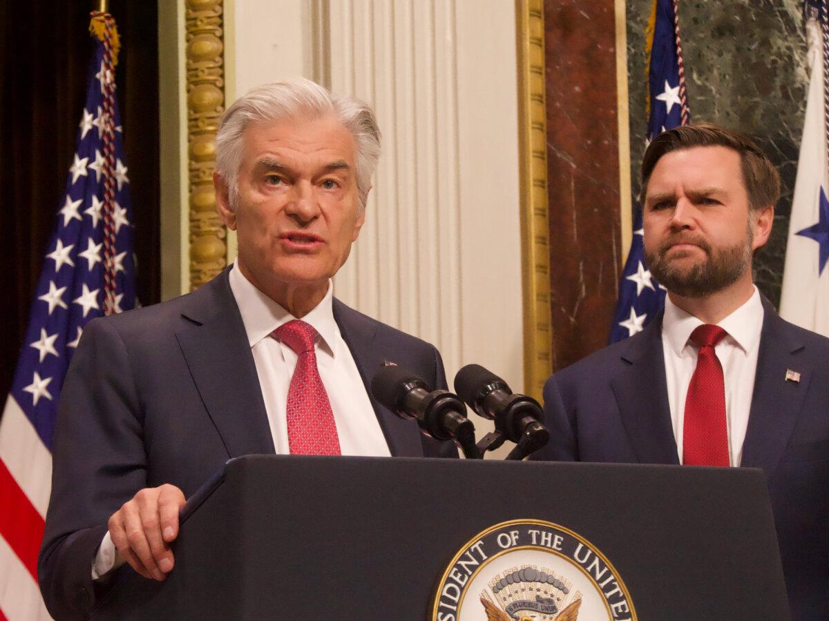 Dr. Mehmet Oz, administrator for the Centers for Medicare and Medicaid Services, speaks at a news conference in the library of the Eisenhower Executive Office Building in Washington on Feb. 25, 2026. (Travis Gillmore/The Epoch Times)