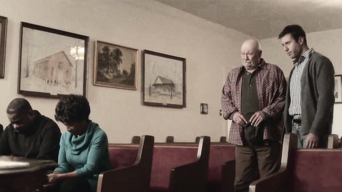 Sam Miller (Barry Corbin, L) and pastor Mike Andrews (Coby Ryan McLaughlin), in "Mountain Top." (Prime Video)