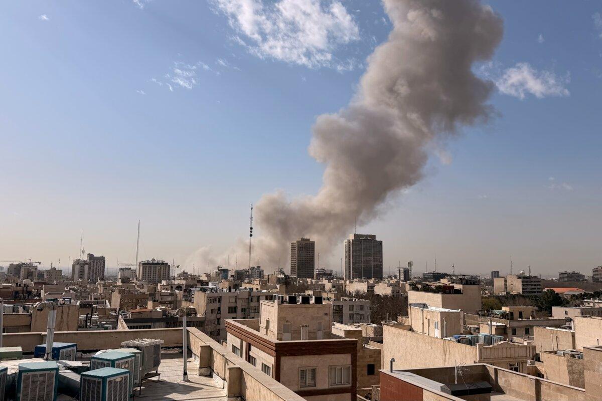 Smoke rises on the skyline after an explosion in Tehran, Iran, on Feb. 28, 2026. (AP Photo)