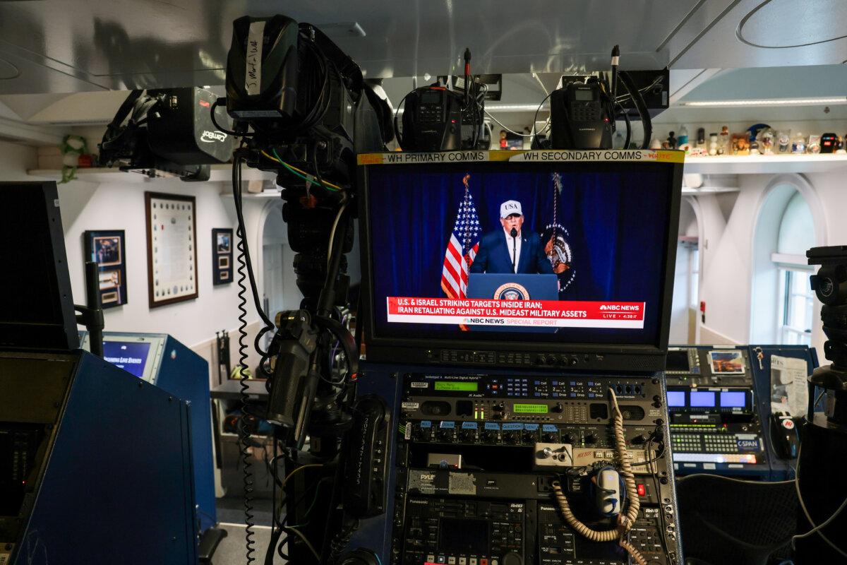 An NBC News live feed airs a clip from President Donald Trump's Truth Social video announcement in the White House James S. Brady Press Briefing Room in Washington, DC, on Feb. 28, 2026. (Anna Moneymaker/Getty Images)
