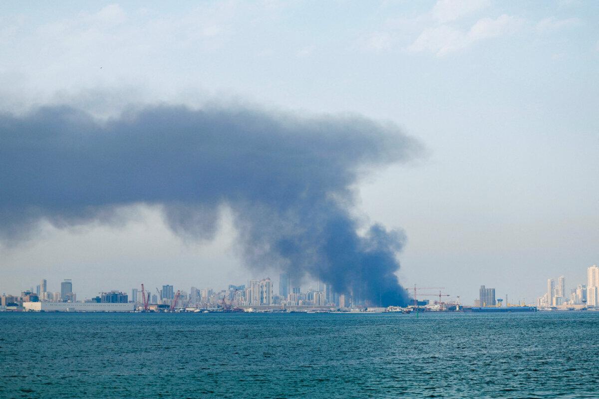 Smoke rises after reported Iranian missile attacks, following strikes by the United States and Israel against Iran, in Manama, Bahrain, on Feb. 28, 2026. (Reuters/Stringer)