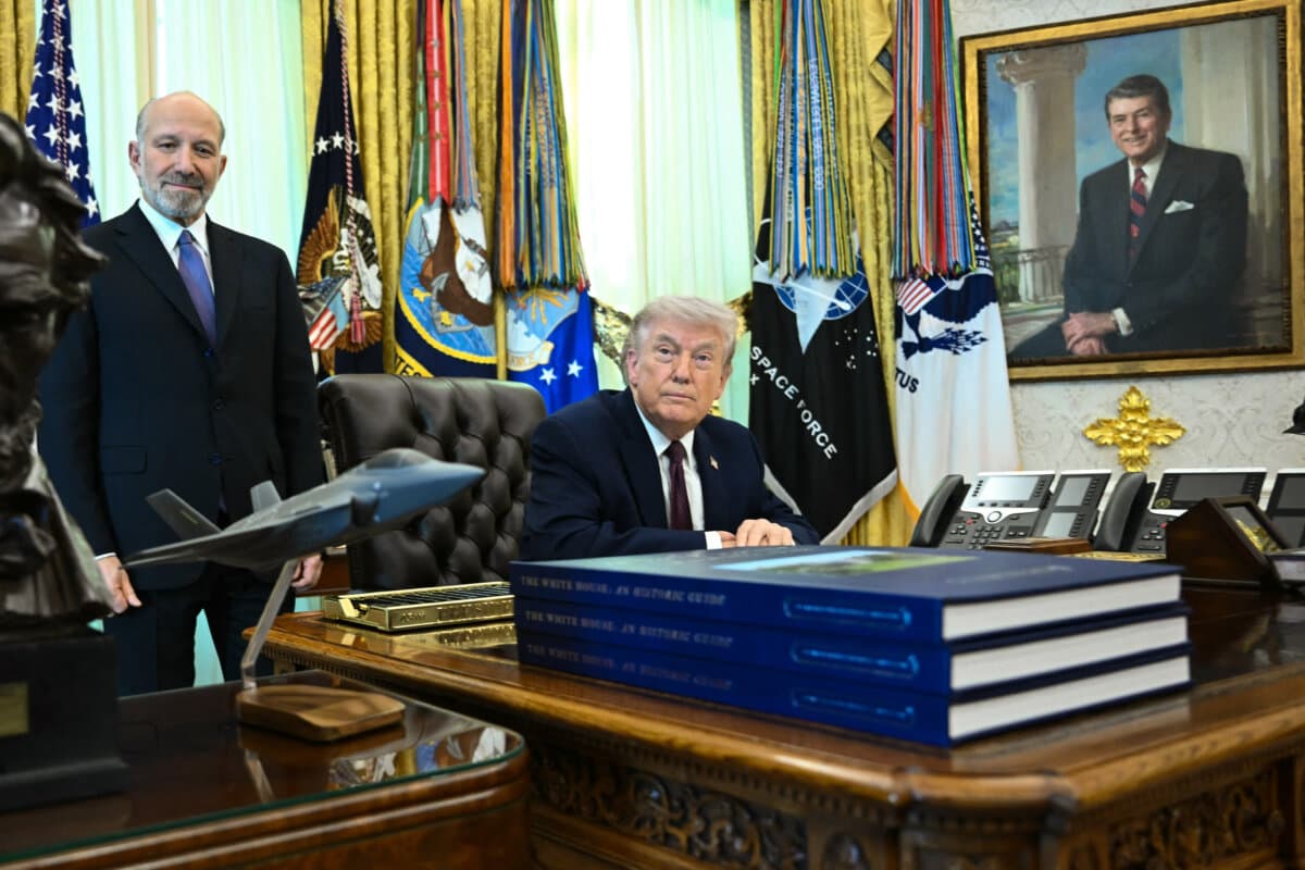 Secretary of Commerce Howard Lutnick and President Donald Trump look on before signing an executive order on election integrity in the Oval Office of the White House on March 31, 2026. (Brendan Smialowski/AFP via Getty Images)