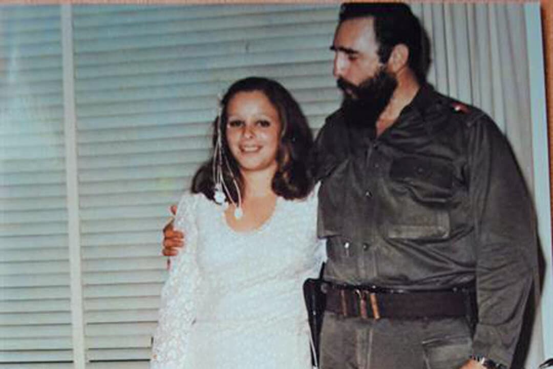Alina Fernández Revuelta with Fidel Castro, celebrating her marriage to Yoyi Jimenez in 1973. From a young age, Fernández became aware of the realities of communism and later emerged as one of the most outspoken critics of her father’s rule. (Courtesy of Alina Fernández Revuelta)