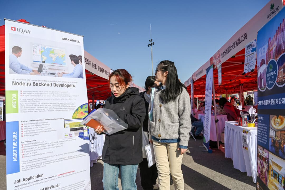 Job seekers attend a job fair in Beijing on March 20, 2024. In June 2023, China’s official youth unemployment rate reached a record 21.3 percent. (Jade Gao/AFP via Getty Images)