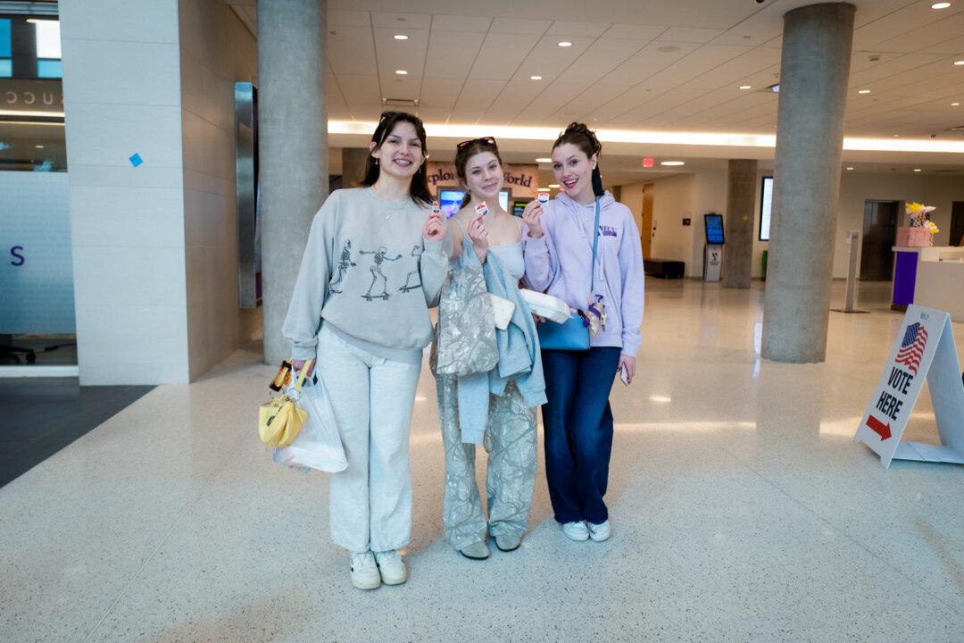 (L-R) Kaylee Nowik, Brooke Benedetti, and McKenna Lawler after casting their votes at an early voting polling site at East Carolina University in Greenville, N.C., on Feb. 12, 2026. (Madalina Kilroy/The Epoch Times)