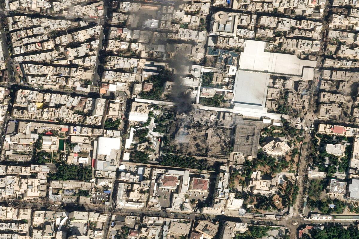 A satellite image shows black smoke rising and heavy damage at Iranian Supreme Leader Ayatollah Ali Khamenei's compound, following strikes by the United States and Israel, in Tehran, Iran, on Feb. 28, 2026. (Pleiades Neo (c) Airbus DS 2026/Handout via REUTERS)