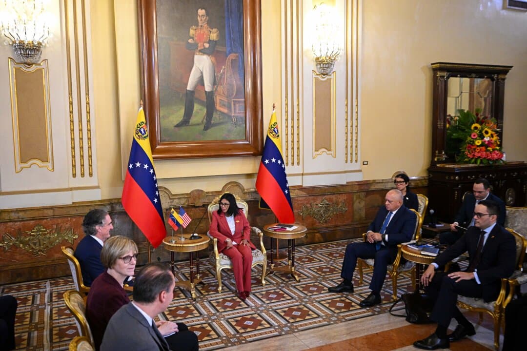 Venezuela's interim president, Delcy Rodriguez (C), speaks alongside U.S. Interior Secretary Doug Burgum (L) and Minister of Interior, Justice and Peace Diosdado Cabello (2nd R) during a meeting at the Miraflores Presidential Palace in Caracas, Venezuela, on March 4, 2026. Burgum is the latest senior U.S. official to visit Venezuela as Washington pushes to ramp up oil and mineral production in the country. (Federico Parra/AFP via Getty Images)
