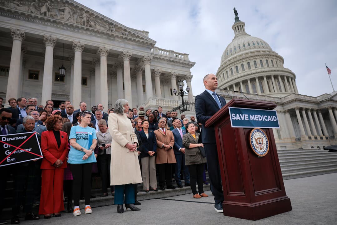 House Minority Leader Hakeem Jeffries (D-N.Y.), joined by fellow Democrats, speaks against the Republican budget bill outside the U.S. Capitol on Feb. 25, 2025. Democrats generally favor increased government intervention in the form of regulation and subsidization, with the goal of ensuring access to health care services for everyone. (Chip Somodevilla/Getty Images)