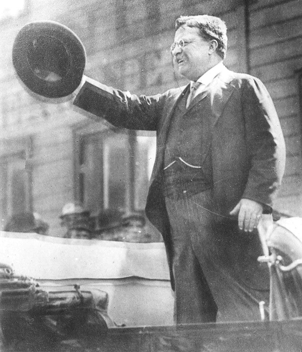 Theodore Roosevelt speaking from a car in Milwaukee on Oct. 14, 1912, shortly before being shot. (Public Domain)