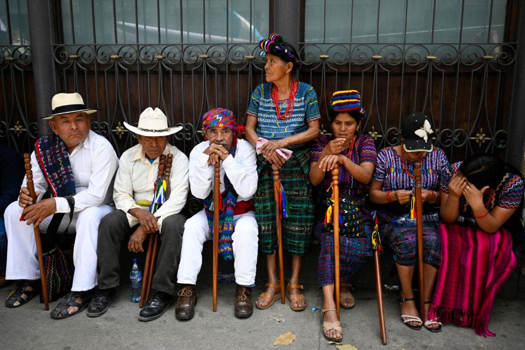 Indigenous authorities take part in a demonstration against the reelection of Guatemalan magistrate Roberto Molina Barreto outside the Congress building in Guatemala City on March 5, 2026. (Johan Ordonez/AFP via Getty Images)
