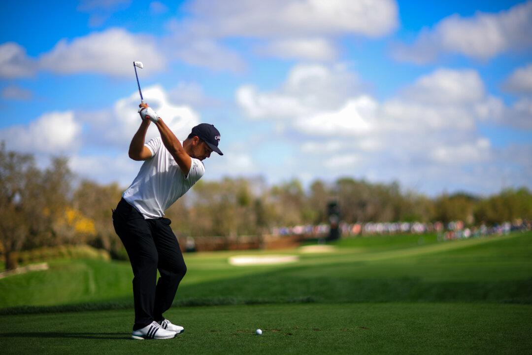 Xander Schauffele of the United States plays his shot from the second tee during the first round of the Arnold Palmer Invitational at Arnold Palmer Bay Hill Golf Course in Orlando on March 5, 2026. (Mike Ehrmann/Getty Images)