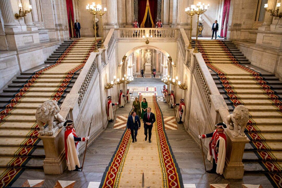 Luxembourg's Grand Duke Guillaume (L) walks with Spain's King Felipe VI as they enter the Royal Palace in Madrid on March 5, 2026. (Daniel Gonzalez /Pool/AFP via Getty Images)