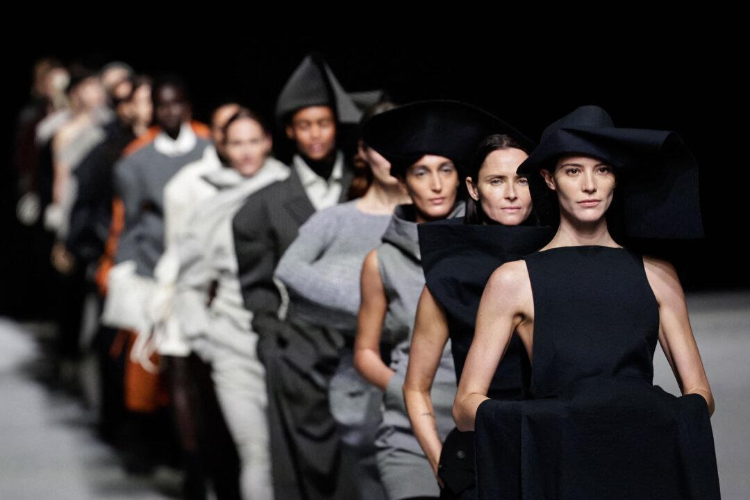 Models present creations by Issey Miyake for the Women's Ready to Wear Fall/Winter 2026-2027 collection fashion show as part of Paris Fashion Week, in Paris, on March 6, 2026. (Stephane de Sakutin/AFP via Getty Images)