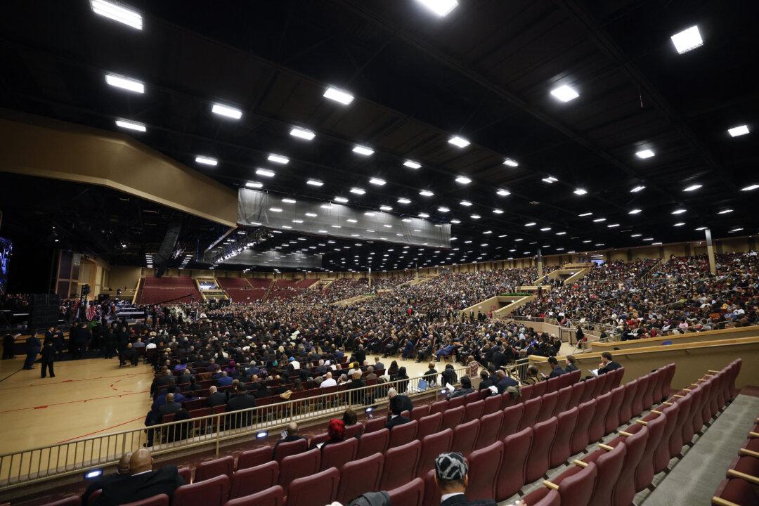 People attend a public memorial service to celebrate the life of civil rights activist Rev. Jesse Jackson in Chicago, on March 6, 2026. Veteran U.S. civil rights activist Jackson, one of the nation's most influential Black voices, died on Feb. 17 at the age of 84. A Baptist minister, Jackson was a civil rights leader since the 1960s, marched with Martin Luther King Jr., and helped fundraise for the cause. (Kamil Krzaczynski/AFP via Getty Images)