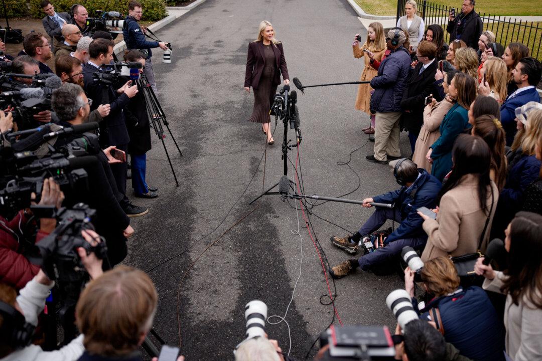 White House Press Secretary Karoline Leavitt stops to speak to the media after a television interview on the North Lawn of the White House on March 6, 2026. (Andrew Harnik/Getty Images)