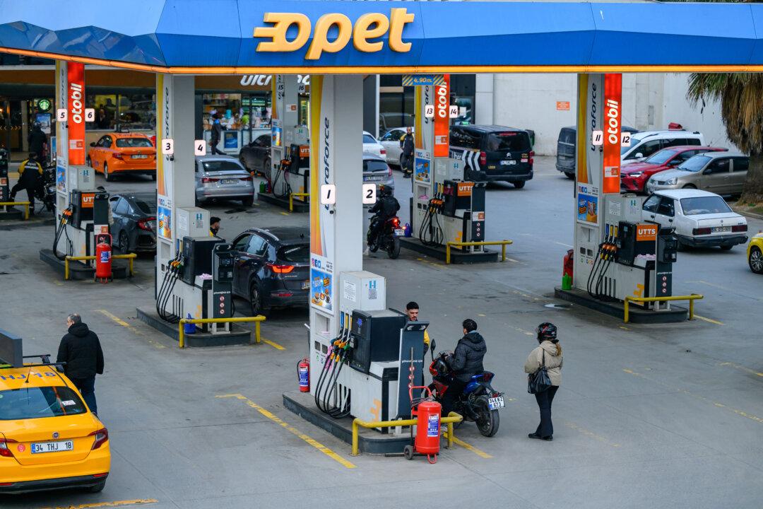People refill their tank at a petrol station in Istanbul on March 6, 2026, with fears of a possible inflationary wave growing as war in the Middle East sends energy prices shooting upwards. (Yasin Akgul/AFP via Getty Images)