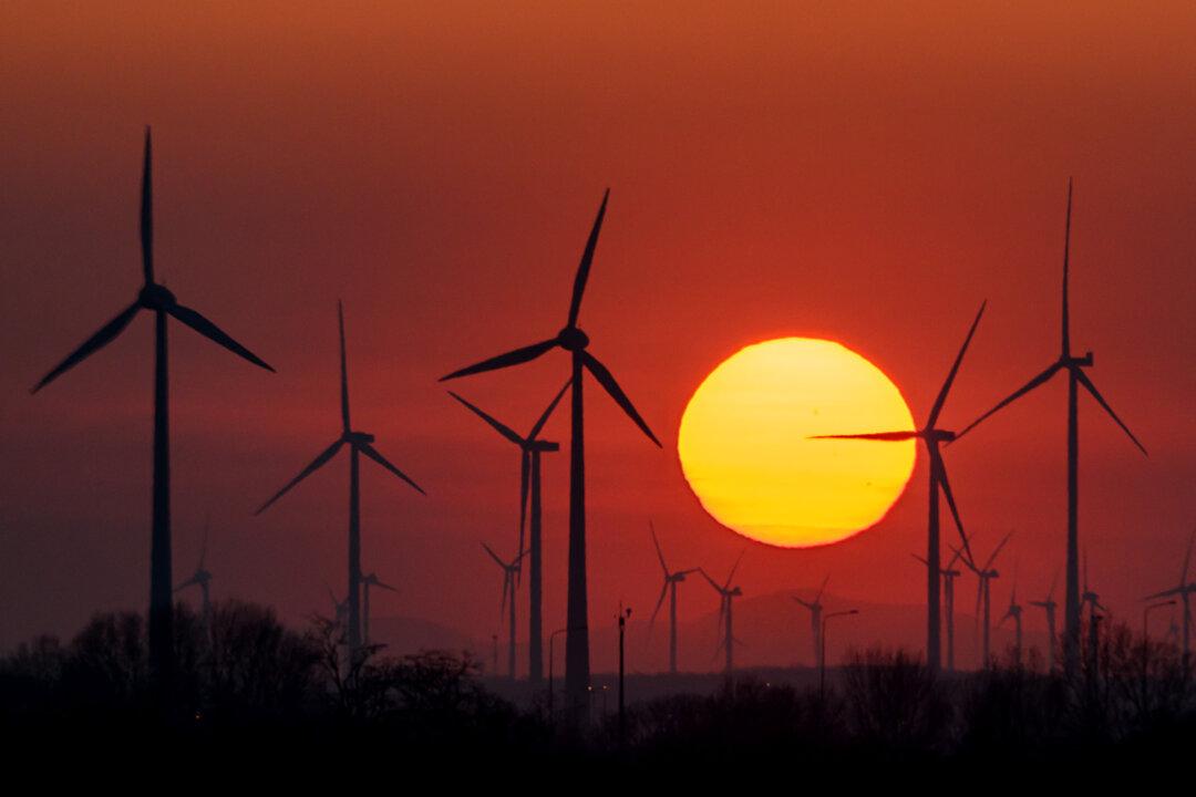 The sun sets behind wind mills near Kittsee, Austria, at the border with Slovakia on March 6, 2026. Lower Austria is the country's leading state for wind energy, with over 800 wind turbines. This represents more than half of the total number of wind turbines in the entire country, with further expansion planned to increase capacity to 8,000 GWh by 2030. (Joe Klamar/AFP via Getty Images)