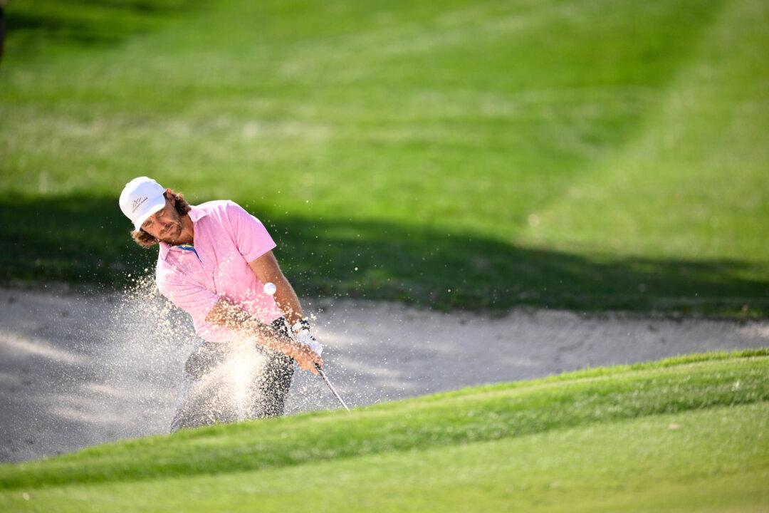 Tommy Fleetwood of Great Britain hits from the bunker on the first hole during the second round of the Arnold Palmer Invitational at Arnold Palmer Bay Hill Golf Course in Orlando, Fla., on March 6, 2026. (Orlando Ramirez/Getty Images)
