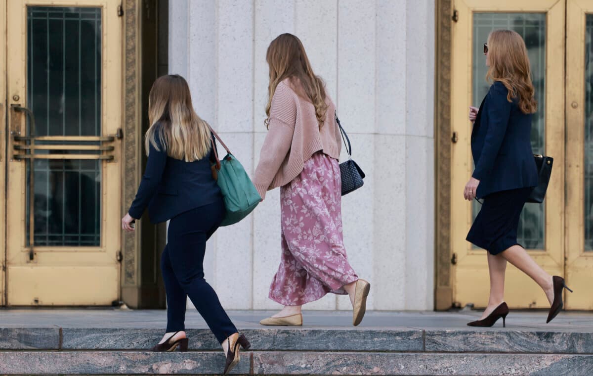 Plaintiff "K.G.M." (C) arrives at Los Angeles Superior Court on Feb. 26, 2026. She was scheduled to testify in a landmark case accusing Meta and YouTube of building addictive social media platforms, causing harm to children. (Mario Tama/Getty Images)