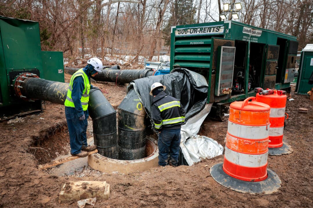 Workers use giant pumps to move sewage around a broken section of the Potomac Interceptor in Cabin John, Md., on Feb. 16, 2026. An estimated 6.75 billion gallons of treated drinking water are slipping through the cracks in America’s pipes every single day. (Chip Somodevilla/Getty Images)