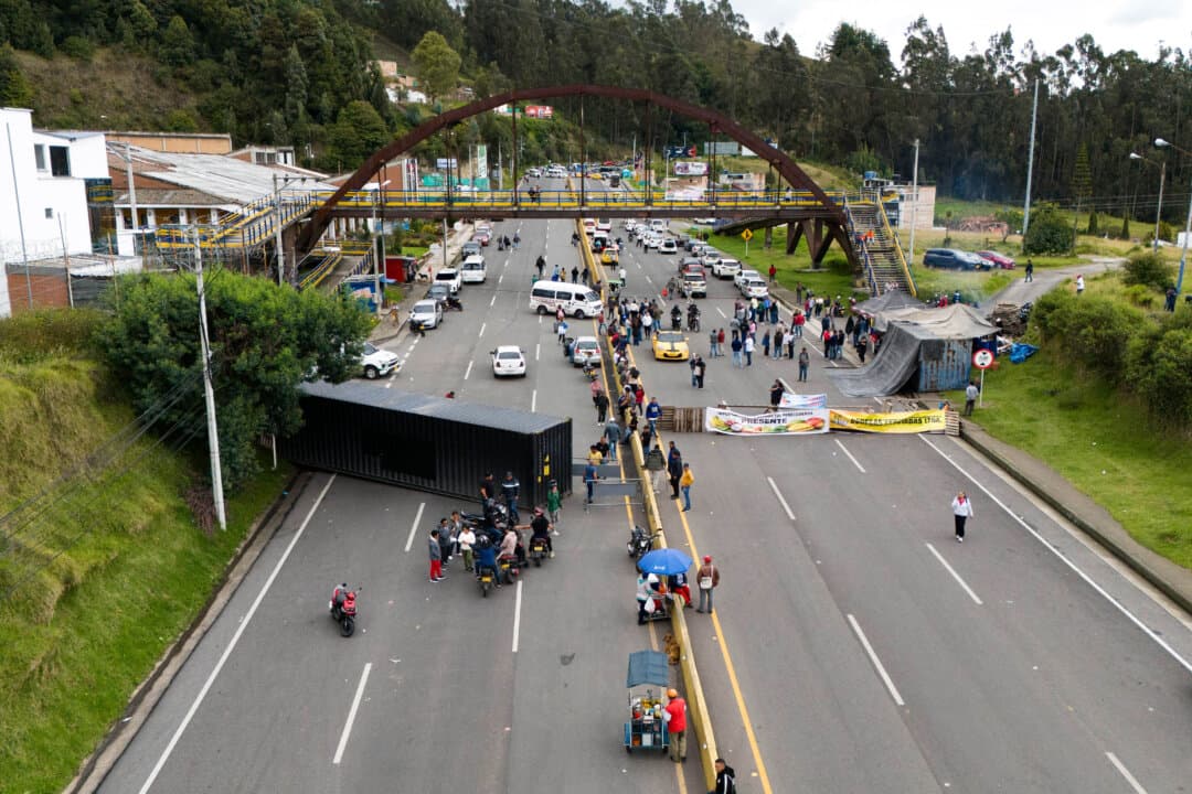 Aerial view of traders blocking the Pan Am road in Ipiales, department of Narino, Colombia, near the border with Ecuador due to the commercial tax war between both countries, on March 12, 2026. (Reicarmyr Canizares/AFP via Getty Images)