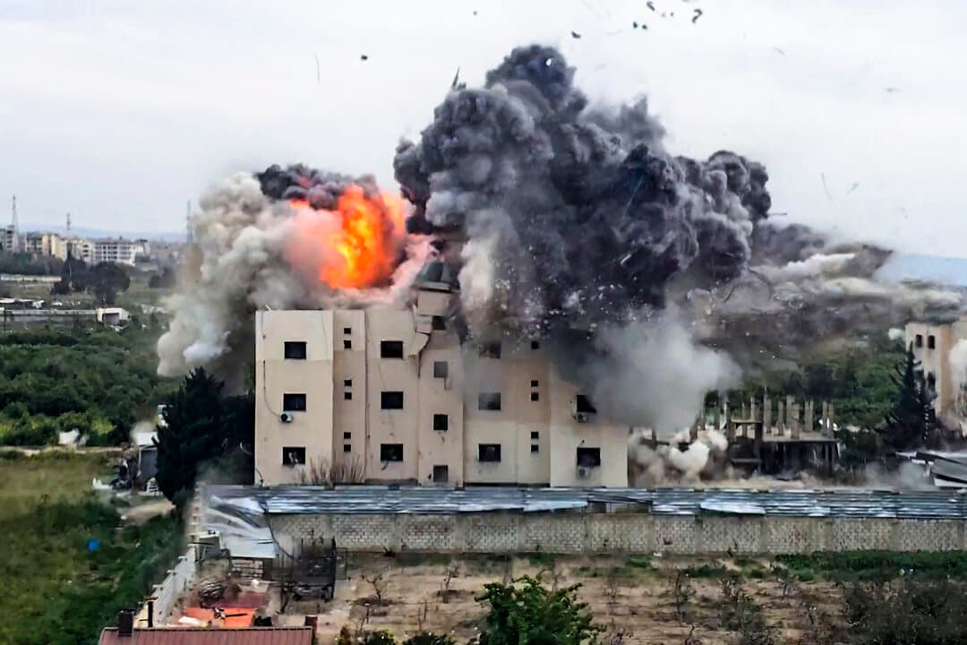 A fireball erupts from the site of an Israeli airstrike that targeted a building in the southern Lebanese village of Al-Aabbassiyah on March 13, 2026. UN Secretary General Antonio Guterres called on Israel and terrorist group Hezbollah to ‘stop the war’ at the start of a visit to Beirut, saying it was ‘no longer the time of armed groups.’ (Kawnat Haju/AFP via Getty Images)