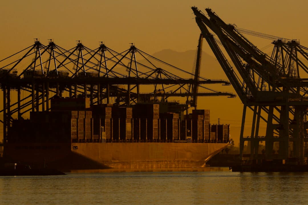 A container ship is docked at the Port of Los Angeles on March 13, 2026, where cargo volumes rose 3 percent in February compared with a year earlier. That makes it the second-busiest February on record, the port said, as retailers and manufacturers were moving shipments ahead of the Lunar New Year despite ongoing uncertainty tied to global conflicts and shifting U.S. trade policy. (Justin Sullivan/Getty Images)