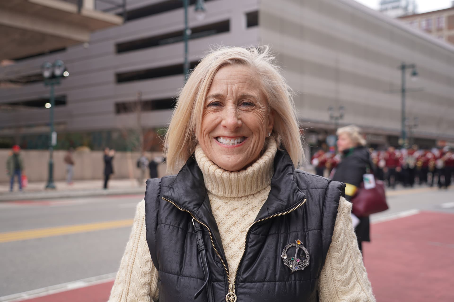 Alice Penza, who lives in Philly but works in New Jersey, enjoys the parade with her family every year. (William Huang/The Epoch Times)