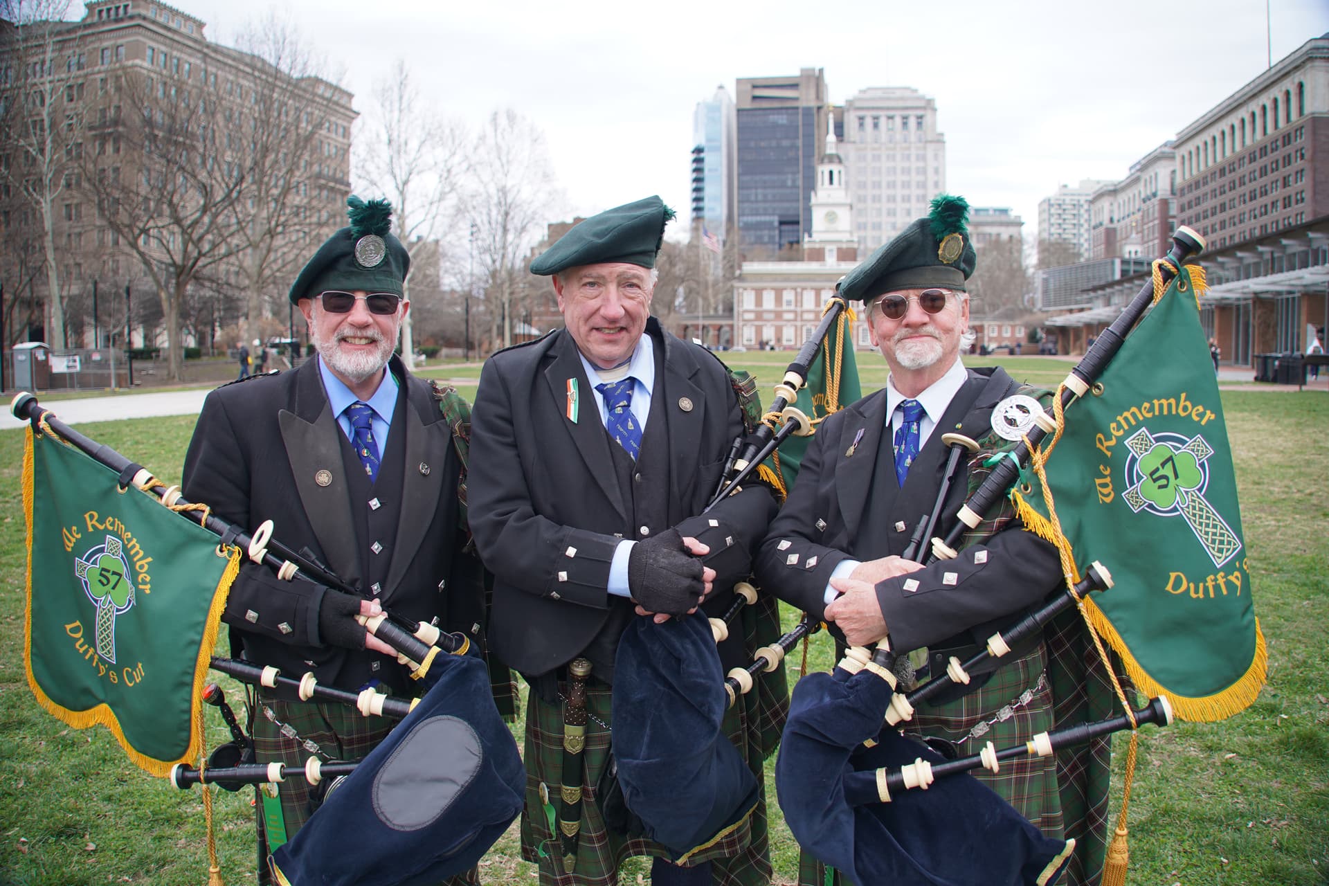 The Gallagher's Irish Society group performs in memory of 57 fallen Irish railroad workers who helped build America. (L-R) Twin brothers Frank Watson and William Watson, and Thomas Conner. (William Huang/The Epoch Times)