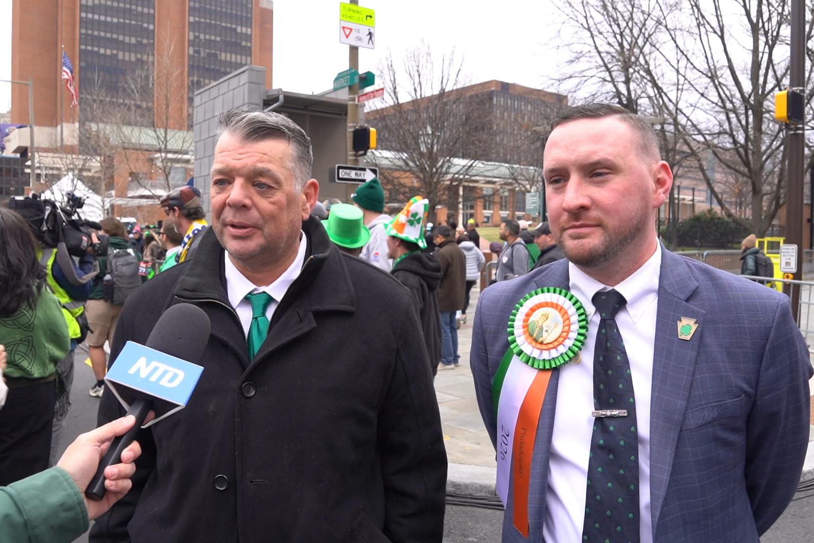 Pennsylvania state Reps. Pat Gallagher (L) and Sean Dougherty march together. (William Huang/The Epoch Times)