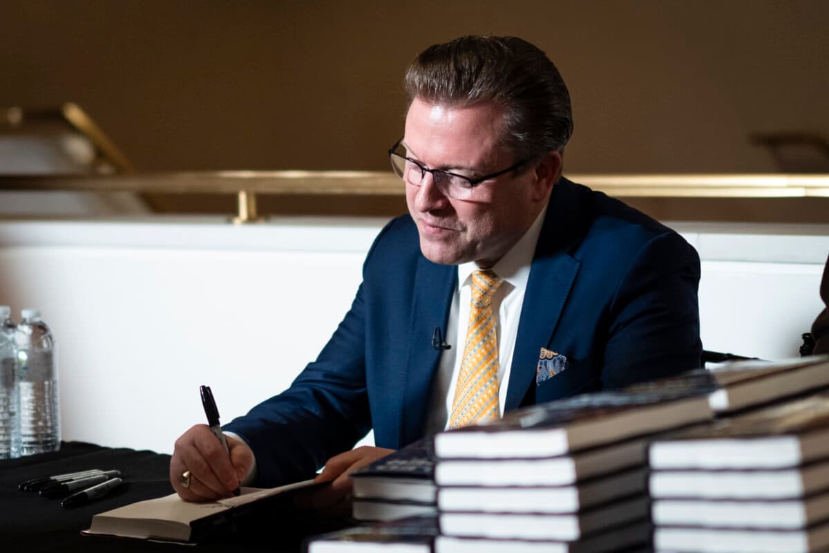 Jan Jekielek, Epoch Times senior editor and host of American Thought Leaders, during his book launch “Killed to Order” at the Trump-Kennedy Center in Washington on March 16, 2026. (Madalina Kilroy/The Epoch Times)