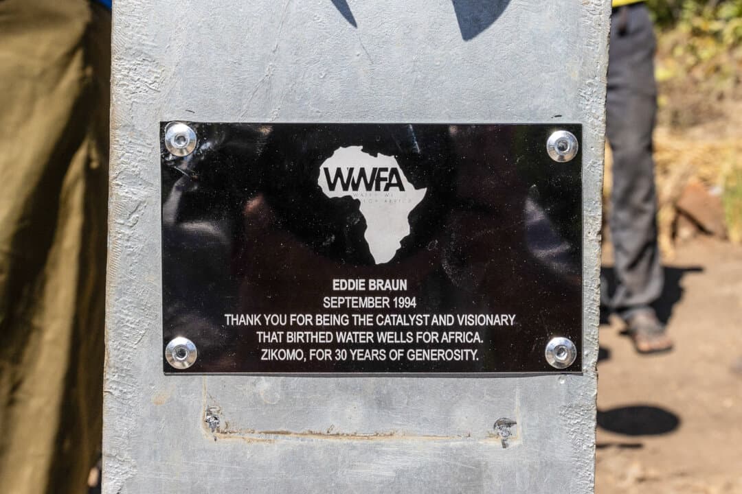 (Top Left) A water well built by Water Wells for Africa, donated by actor Charlie Sheen, continues operation in southern Malawi on June 30, 2021. (Top Right–Bottom Left) Villagers enjoy clean water from a well built by Water Wells for Africa on July 6, 2018. (Bottom Right) A water well funded by stuntman Eddie Braun sits in operation in southern Malawi on June 7, 2023. (John Fredricks/The Epoch Times)