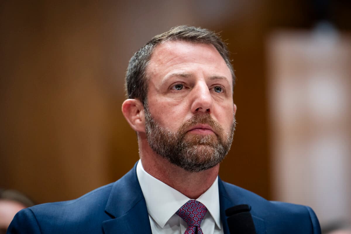 Sen. Markwayne Mullin (R-Okla.) testifies during his confirmation hearing to lead the Department of Homeland Security on Capitol Hill in Washington on March 18, 2026. (Madalina Kilroy/The Epoch Times)