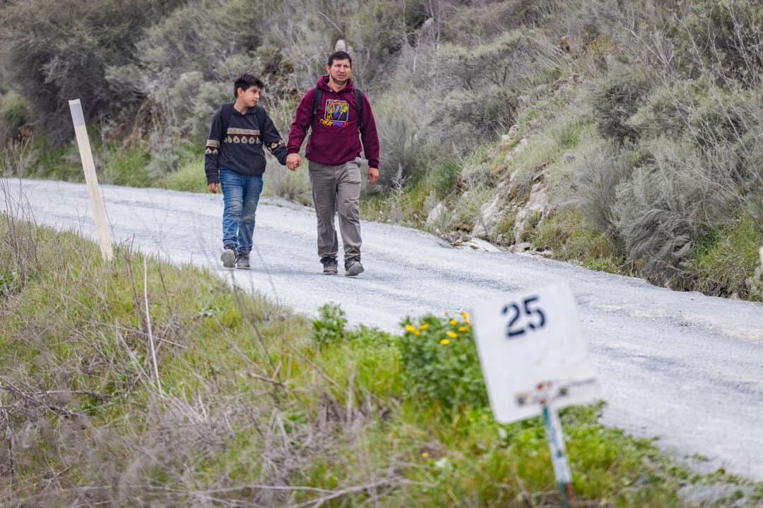 (Top) A former migrant encampment known as “Moon Camp” now sits empty of illegal immigrants in Jacumba Hot Springs, Calif., on Jan. 22, 2026. (Bottom Left) Construction on the U.S. southern border wall is seen from Otay Mesa, Calif., on Jan. 21, 2026. (Bottom Right) Illegal immigrants walk toward a Border Patrol checkpoint on Otay Mountain east of San Diego on Feb. 29, 2024. (John Fredricks/The Epoch Times)