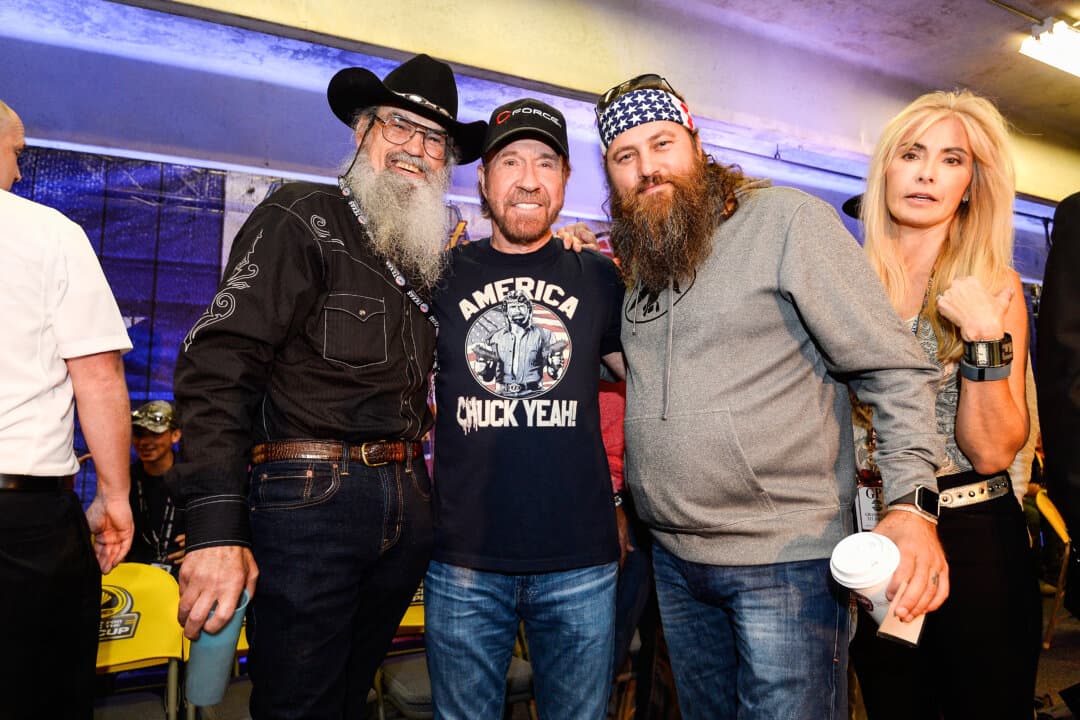Actor Chuck Norris poses with Si and Willie Robertson, of “Duck Dynasty,” at the drivers' meeting prior to the NASCAR Sprint Cup Series AAA Texas 500 at Texas Motor Speedway in Fort Worth, Texas, on Nov. 6, 2016. (Robert Laberge/Getty Images)