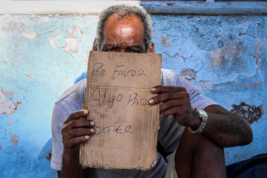 (Top Left) A man rummages through a dumpster in Havana on July 15, 2025. (Top Right) Homeless people sitting and lying on a street in Havana on July 21, 2025. (Bottom Left) A man begs for food on a street in Havana on July 21, 2025. (Bottom Right) A man carries collected garbage on a street in Havana on July 21, 2025. Poverty levels have increased sharply as the Caribbean country reckons with its worst economic crisis in three decades, marked by shortages of food, medicine, and fuel, as well as daily power blackouts. (Adalberto Roque/AFP via Getty Images, Yamil Lage/AFP via Getty Images)