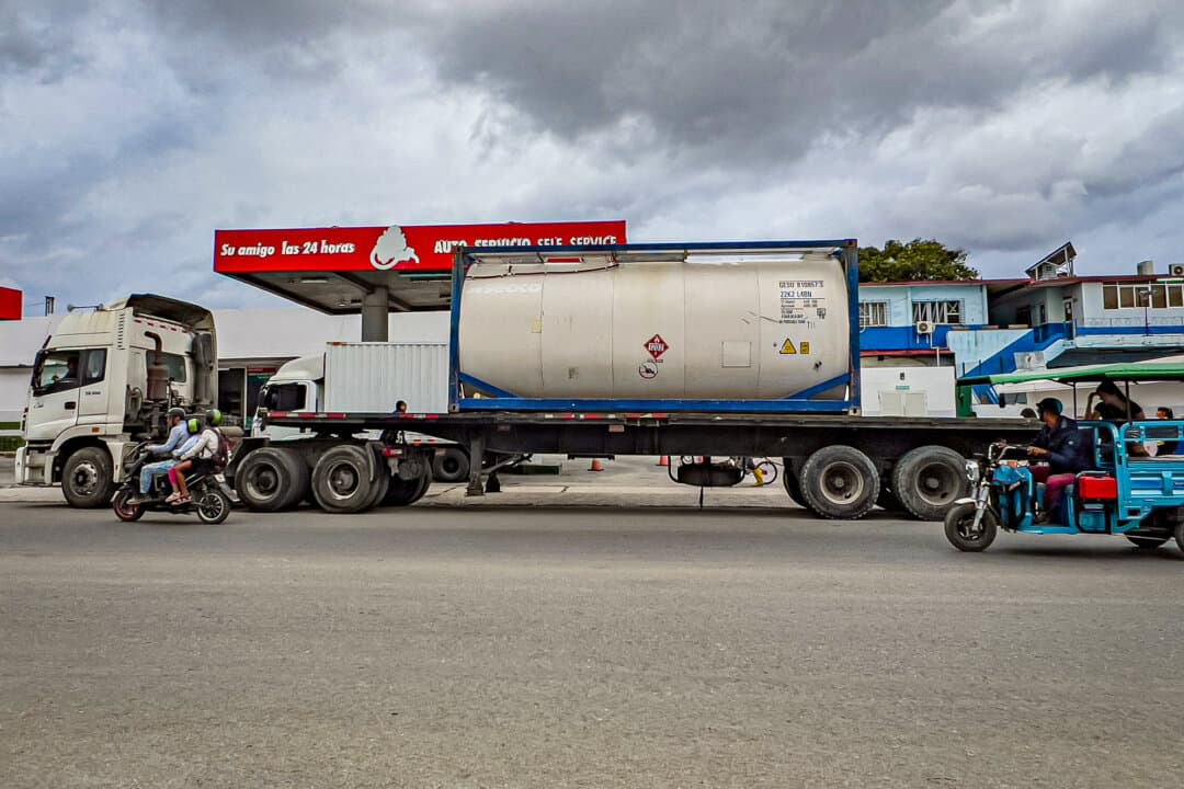 A truck belonging to a private Cuban company remains parked in front of a gas station with an ISO tank of imported fuel in Havana on March 19, 2026. The Cuban regime has allowed private small and medium-sized enterprises to source fuel via state importers to ease shortages, after Venezuelan and Mexican supplies dried up, and as the United States moved to license resales to Cuba's private sector. (Adalberto Roque/AFP via Getty Images)