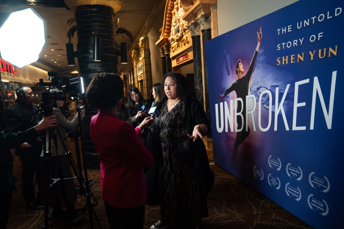 Audience members are interviewed at the world premiere of "Unbroken: The Untold Story of Shen Yun" at the AMC Lincoln Square movie theater in New York City on March 24, 2026. (Samira Bouaou/The Epoch Times)