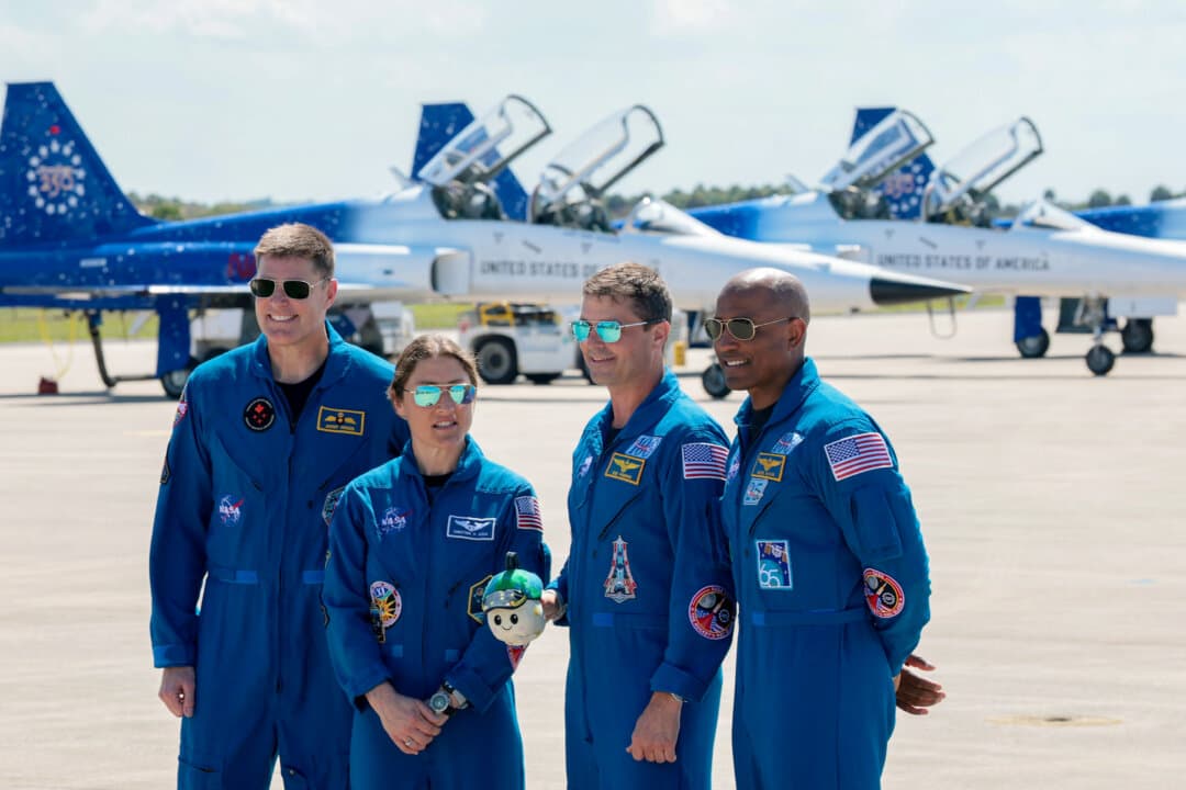 (L–R) The Artemis II crew: Mission Specialist Jeremy Hansen of the Canadian Space Agency, Mission Specialist Christina Koch, Commander Reid Wiseman, and Pilot Victor Glover stand together after arriving at the Kennedy Space Center in Cape Canaveral, Fla., on March 27, 2026. (Joe Raedle/Getty Images)