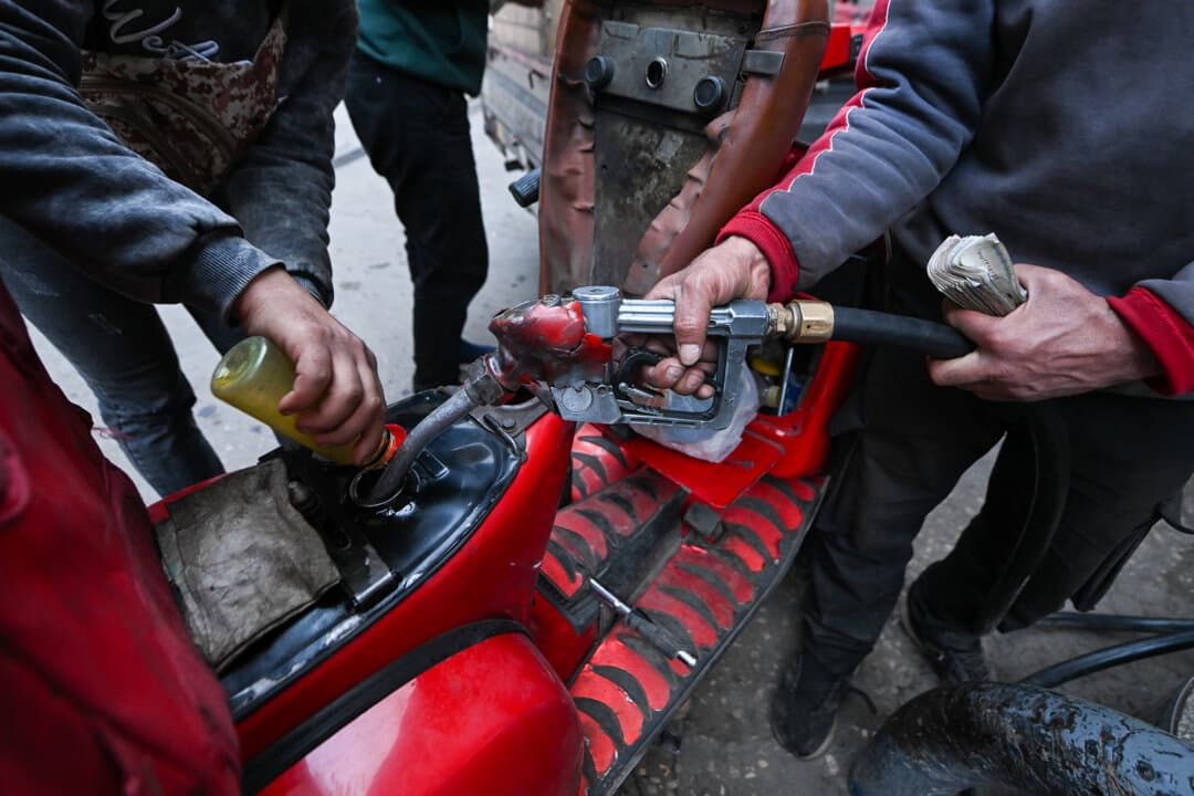 Customers refuel vehicles at a gas station in Cairo on April 1, 2026. (Sayed Hassan/Getty Images)