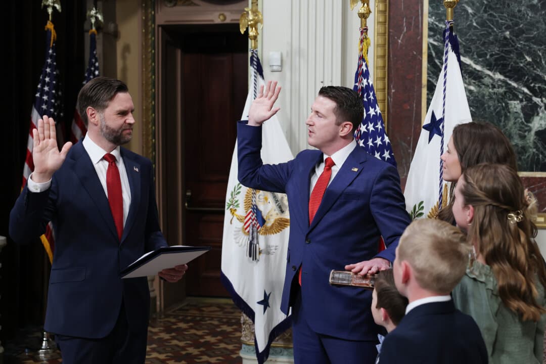 Vice President JD Vance swears in Colin McDonald alongside his family to be the assistant attorney general for fraud enforcement at the Department of Justice in the Indian Treaty Room of the Eisenhower Executive Office Building in Washington on April 1, 2026. (Anna Moneymaker/Getty Images)